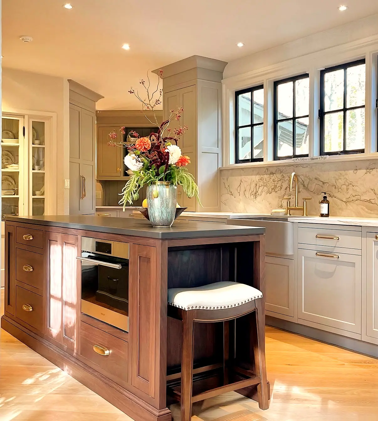 Custom kitchen renovation with a warm wood island